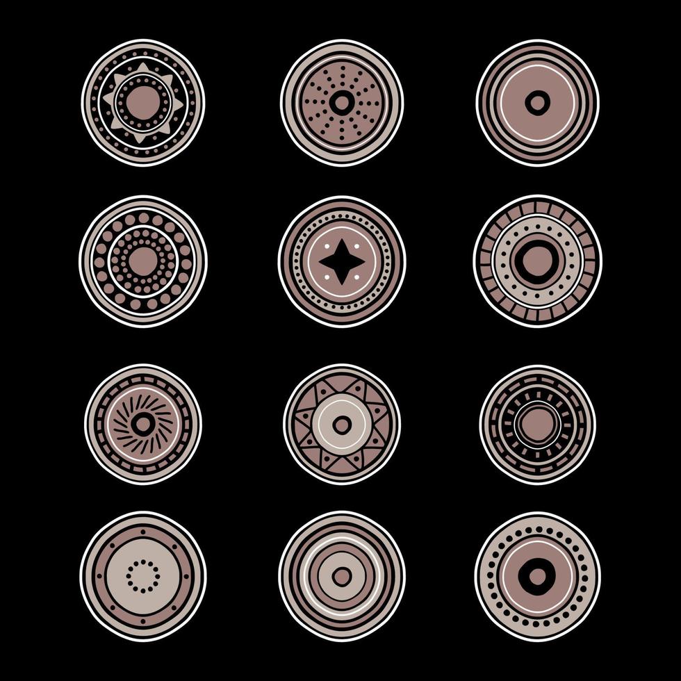 conjunto de doce monedas tribales aislado sobre fondo negro. vector