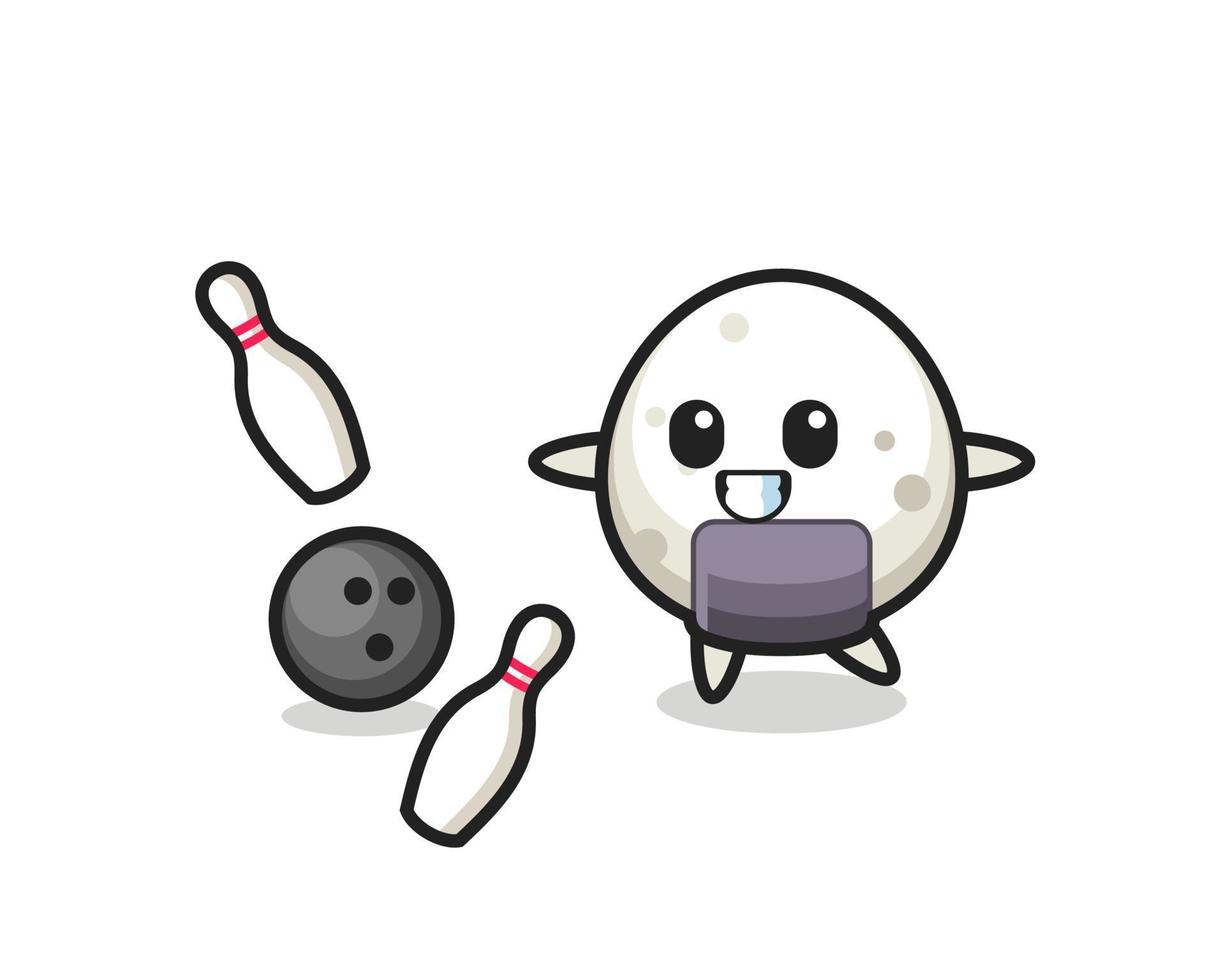 personaje de dibujos animados de onigiri está jugando a los bolos vector