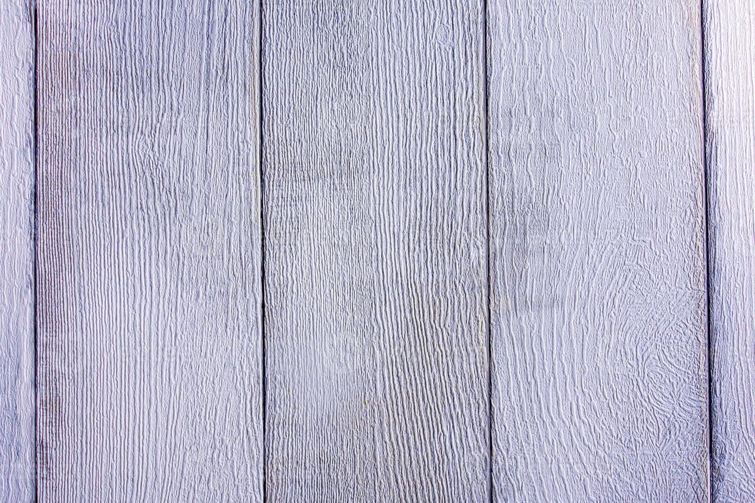 Textura de la superficie de la pared de madera artificial hecha de material sustituto. foto