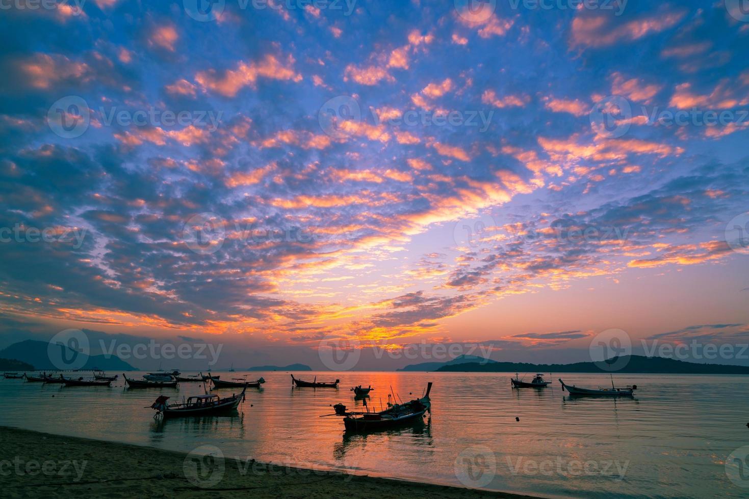 Longtail boats with Travel boats in tropical sea photo