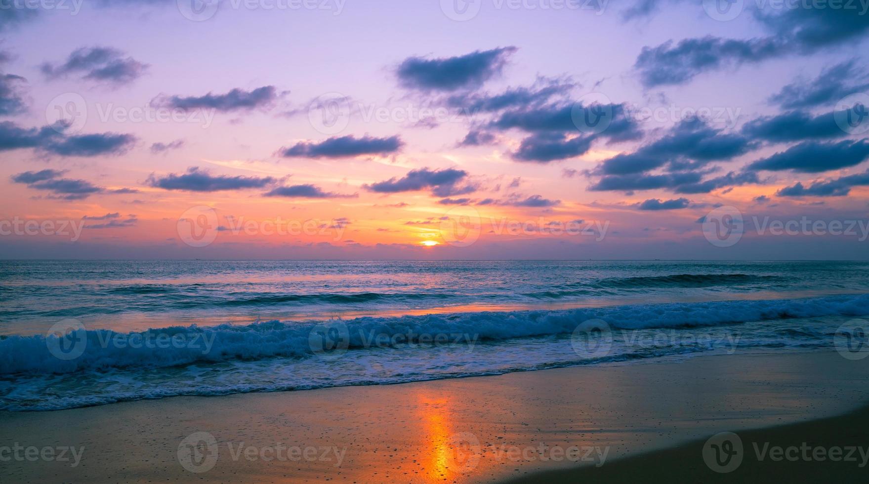 Beautiful light sunset or sunrise at the sea photo