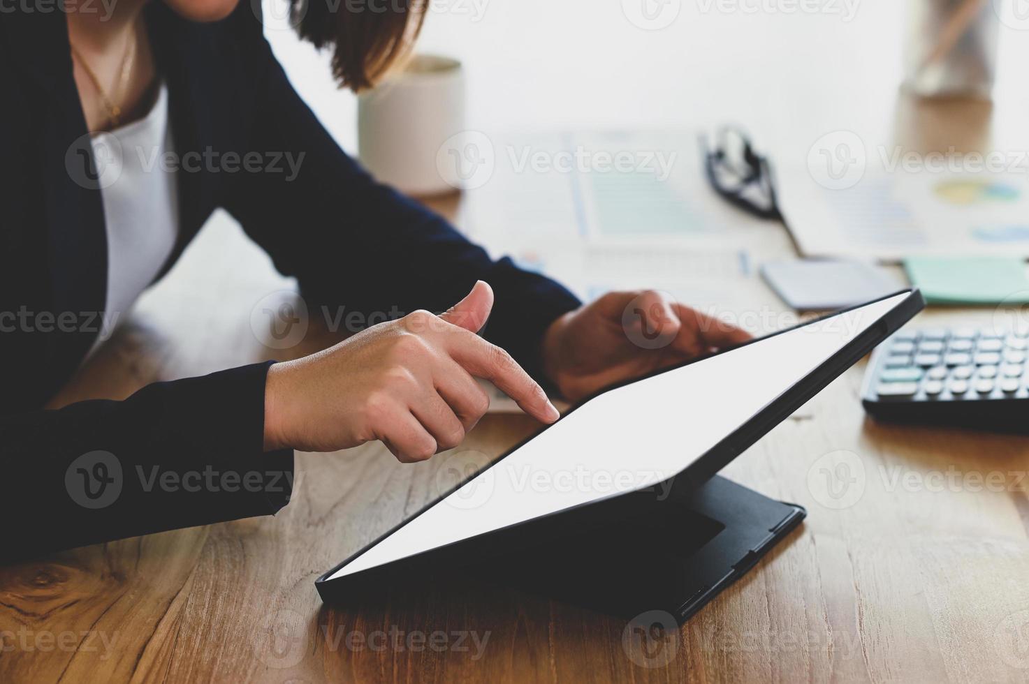 Businesswoman using digital tablet. photo