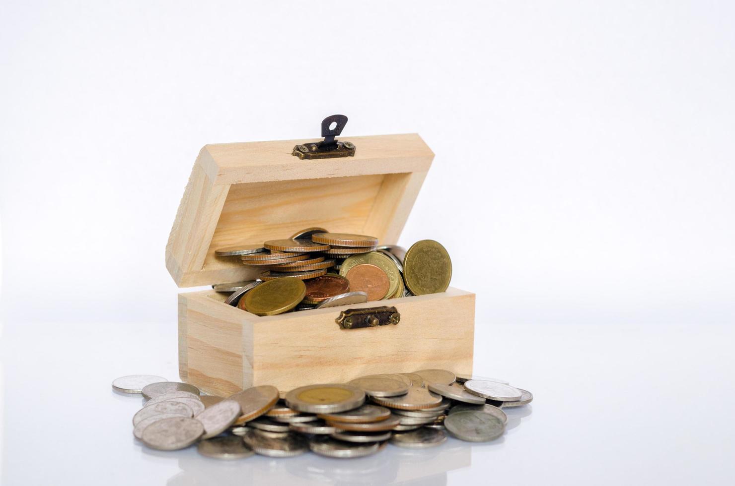 Inner lid with gold coin white background Isolate The concept of treasure and value for money photo