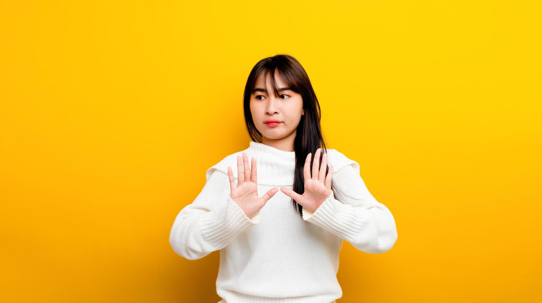 Easily upset Portrait of an Asian girl Upset with arms photo