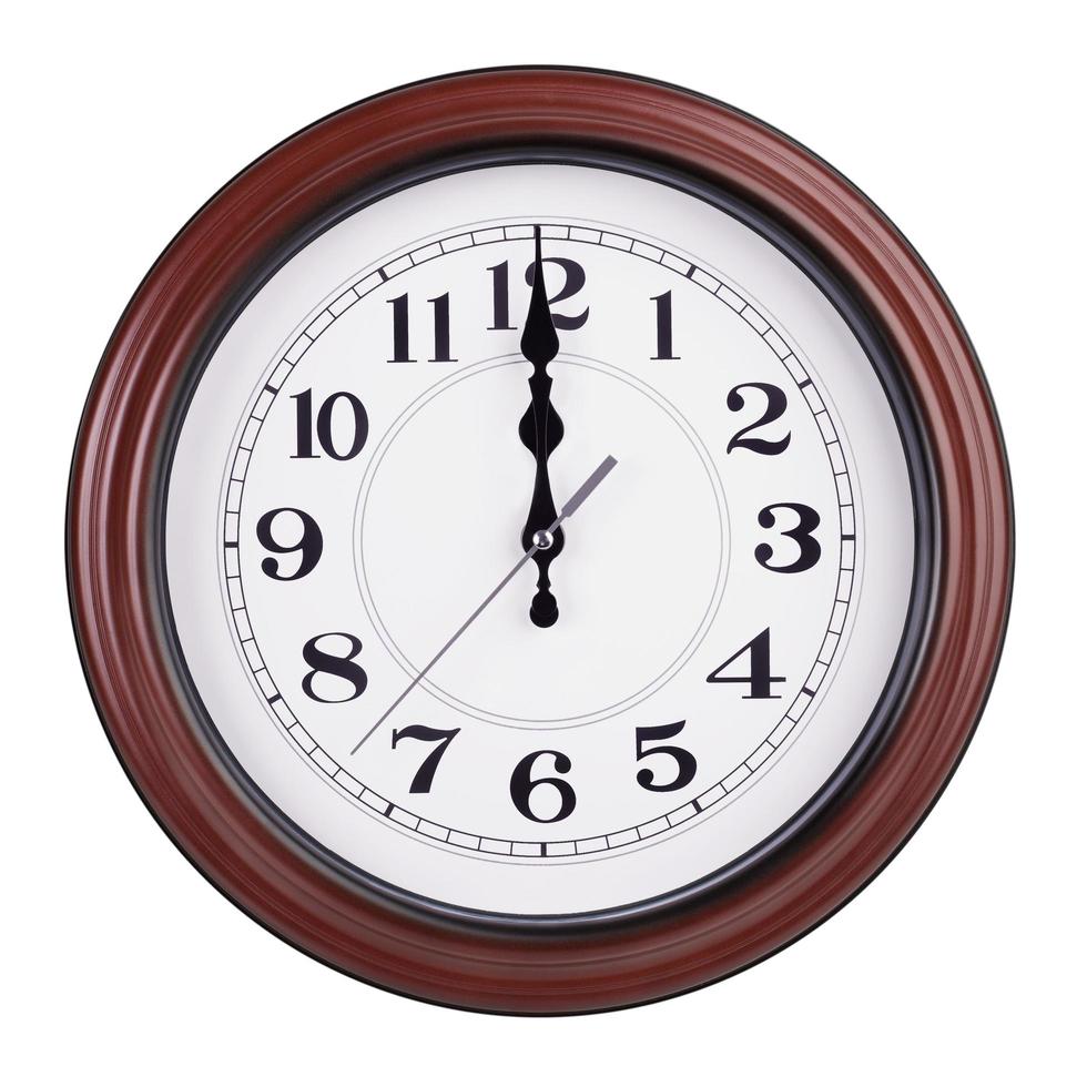 Noon on the dial of the round clock photo