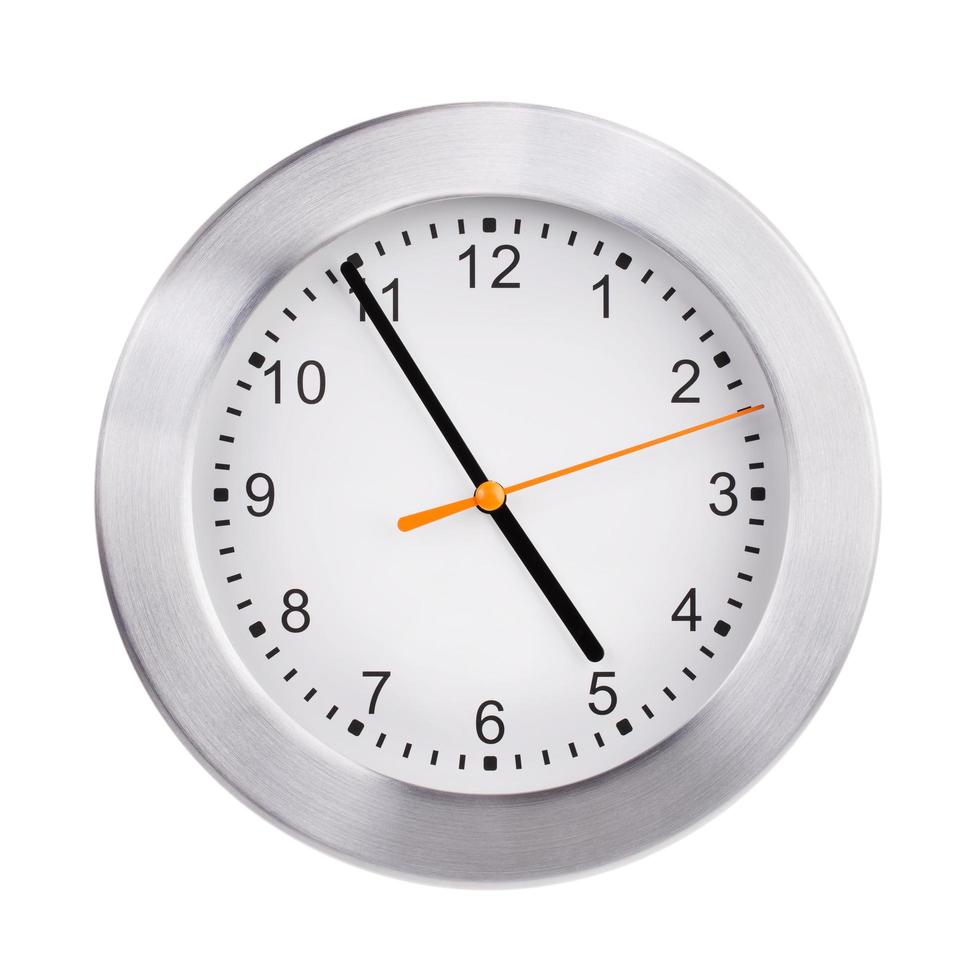 Office round clock shows almost five hours photo