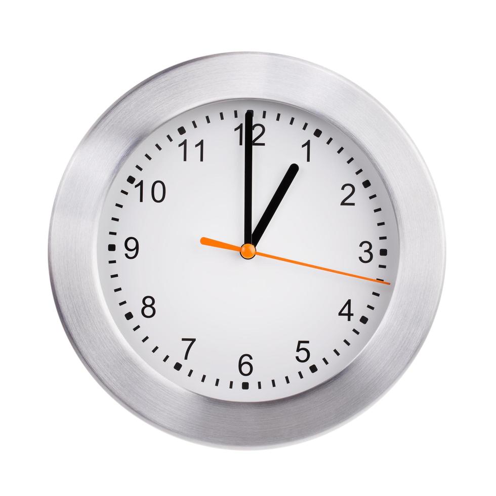 Exactly one hour on the round clock photo