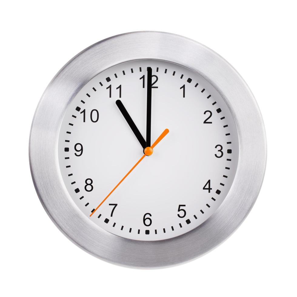 Exactly eleven hours on a round dial photo