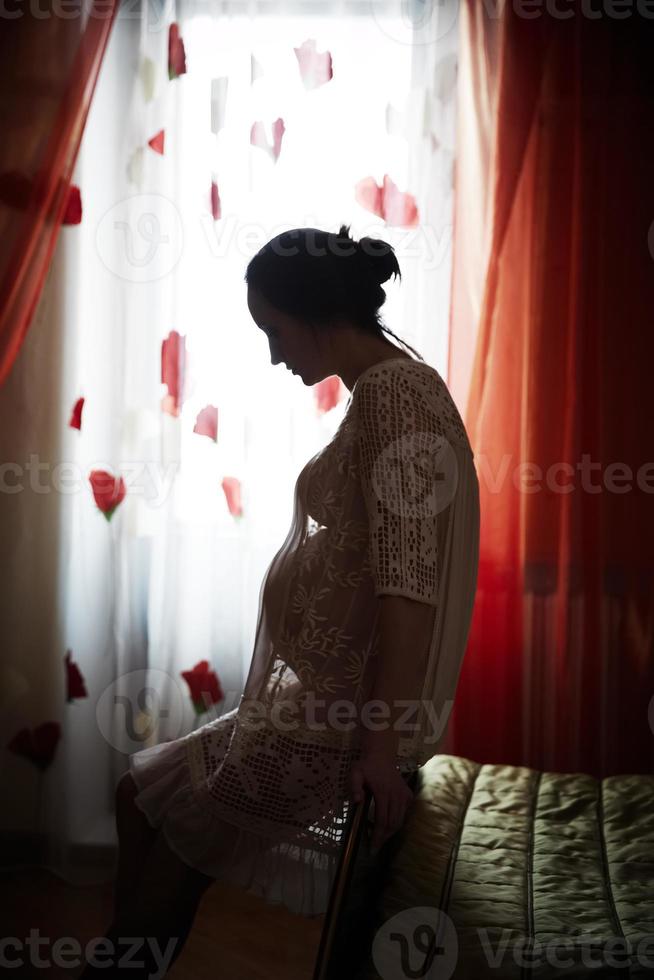 Young pregnant woman photo