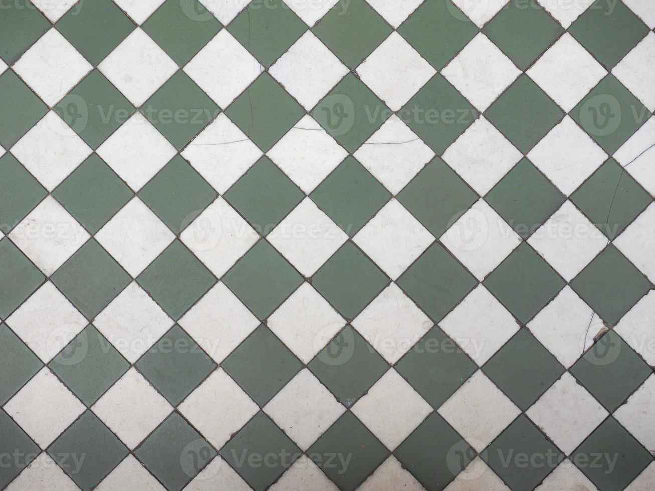 Green and white tiled floor photo