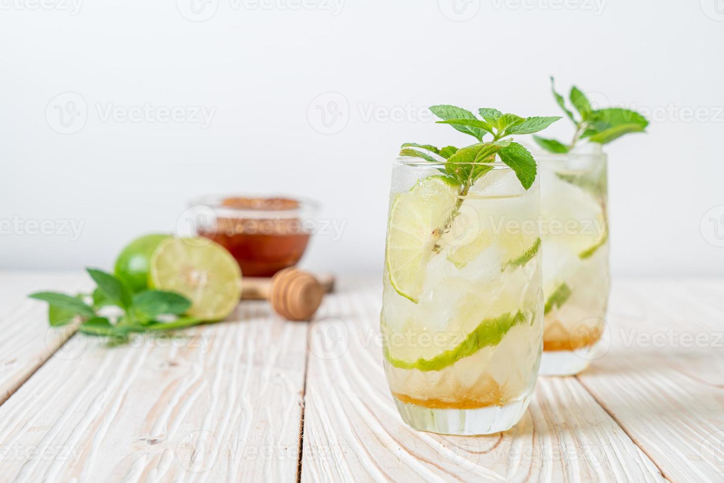 iced honey and lime soda with mint photo