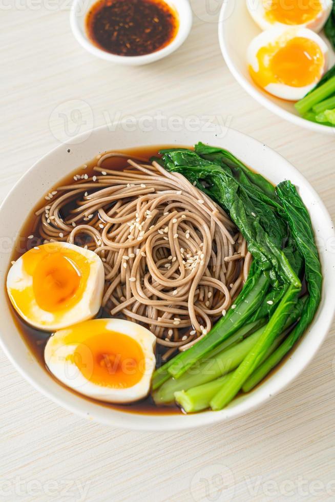 ramen noodles with egg - vegan or vegetarian food style photo