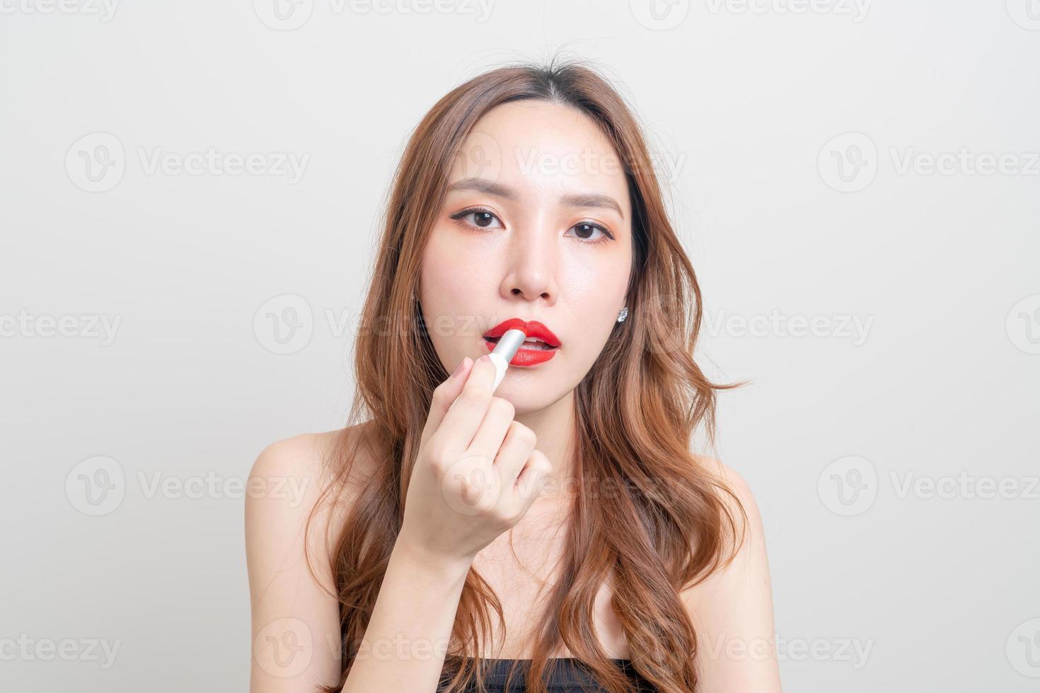portrait beautiful woman make up and using red lipstick photo