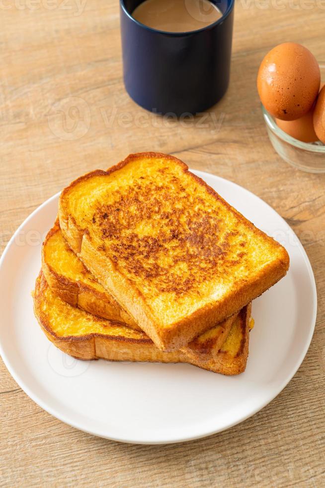 french toast on white plate photo