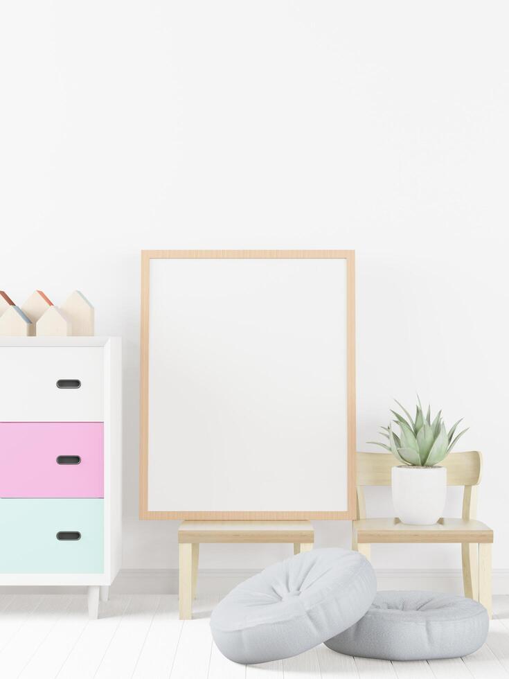 The living room is decorated with a storage table, picture frames and small plant pots. photo