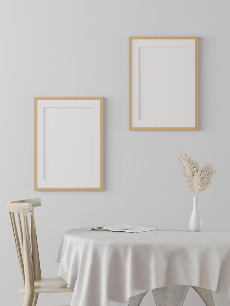The living room is decorated with furniture, small plant pots and picture frames. photo