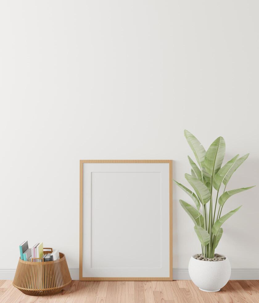 The living room is decorated with furniture, small plant pots and picture frames. photo