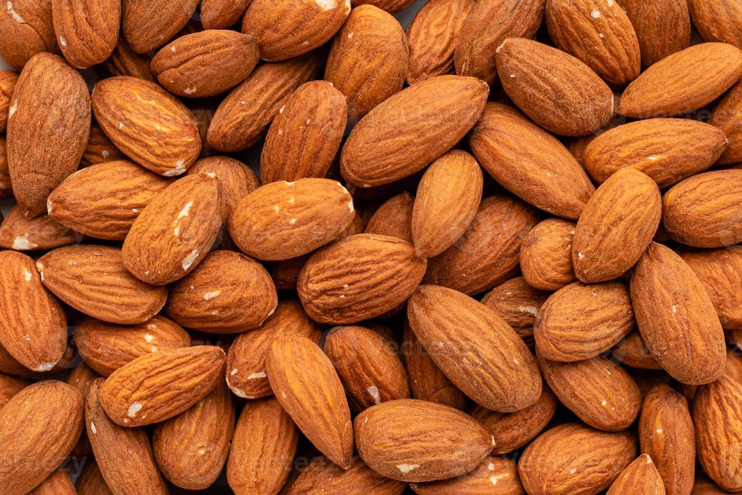 nueces de almendra de cerca. se puede utilizar como fondo foto