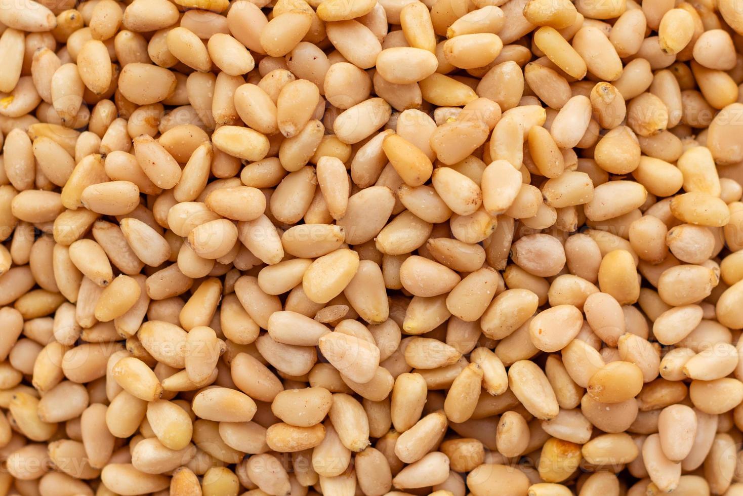 Pine nuts close up. It can be used as a background photo