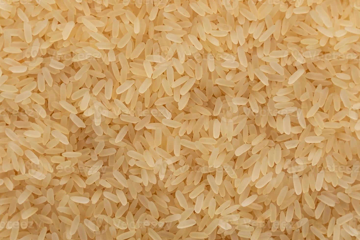 Rice in a white saucer on a gray concrete background photo