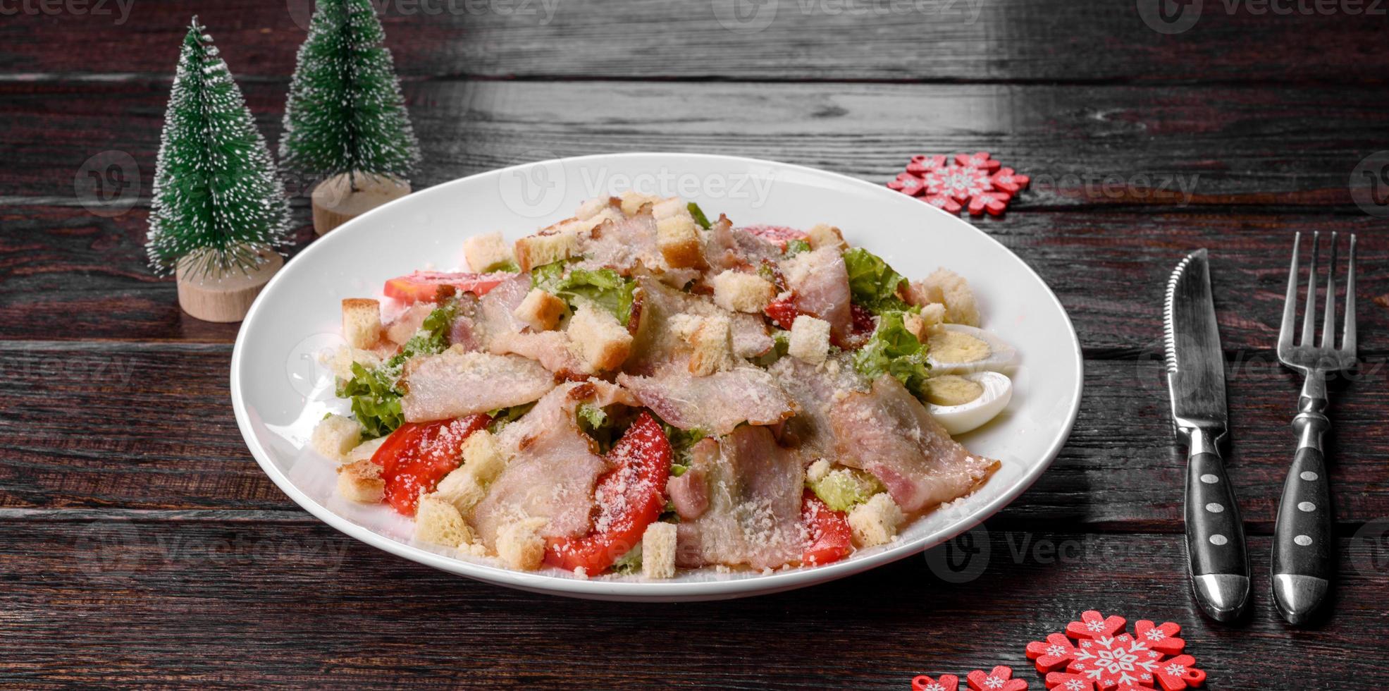 Tasty fresh salad prepared for the Christmas table photo