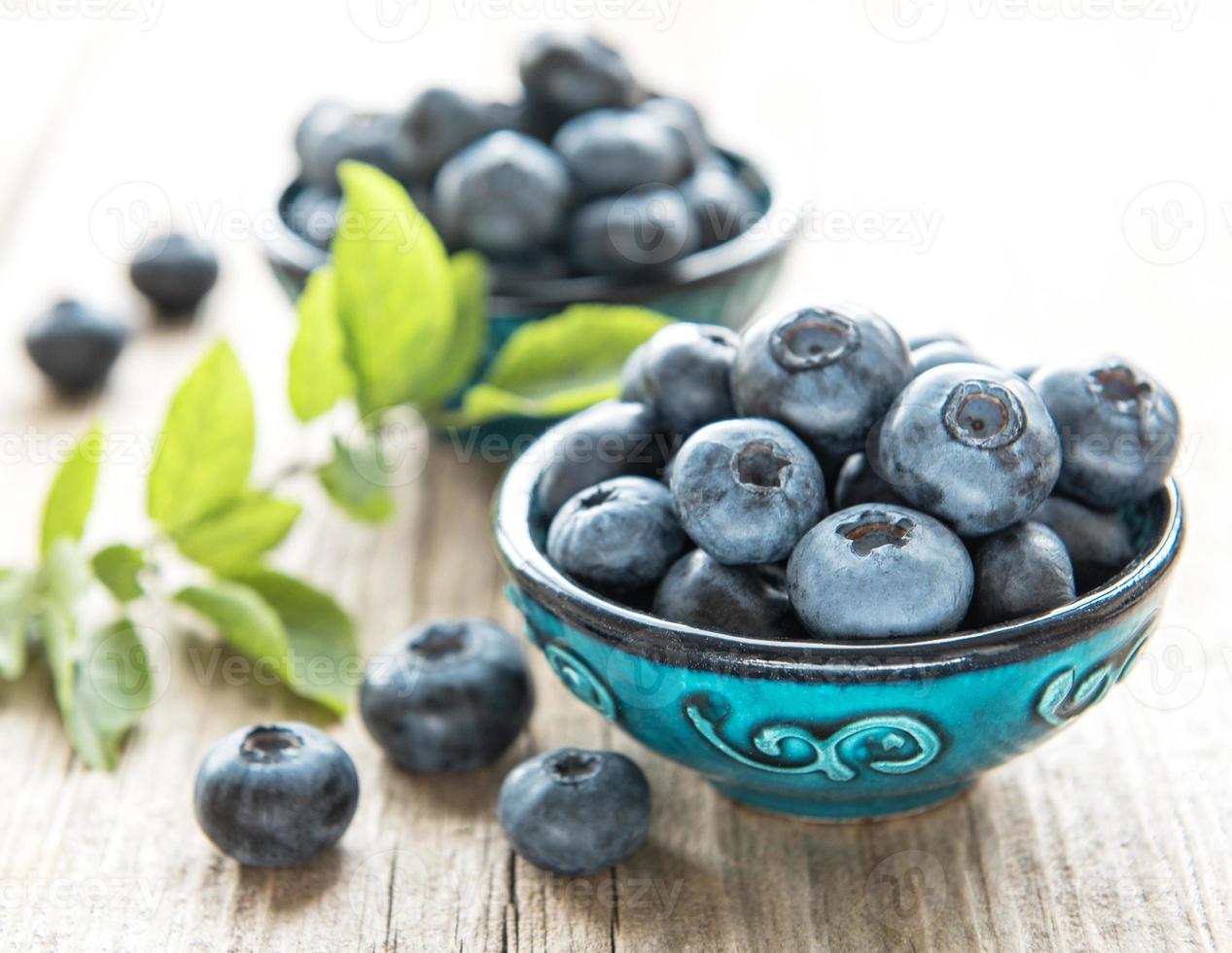 Blueberries on a  wooden background photo