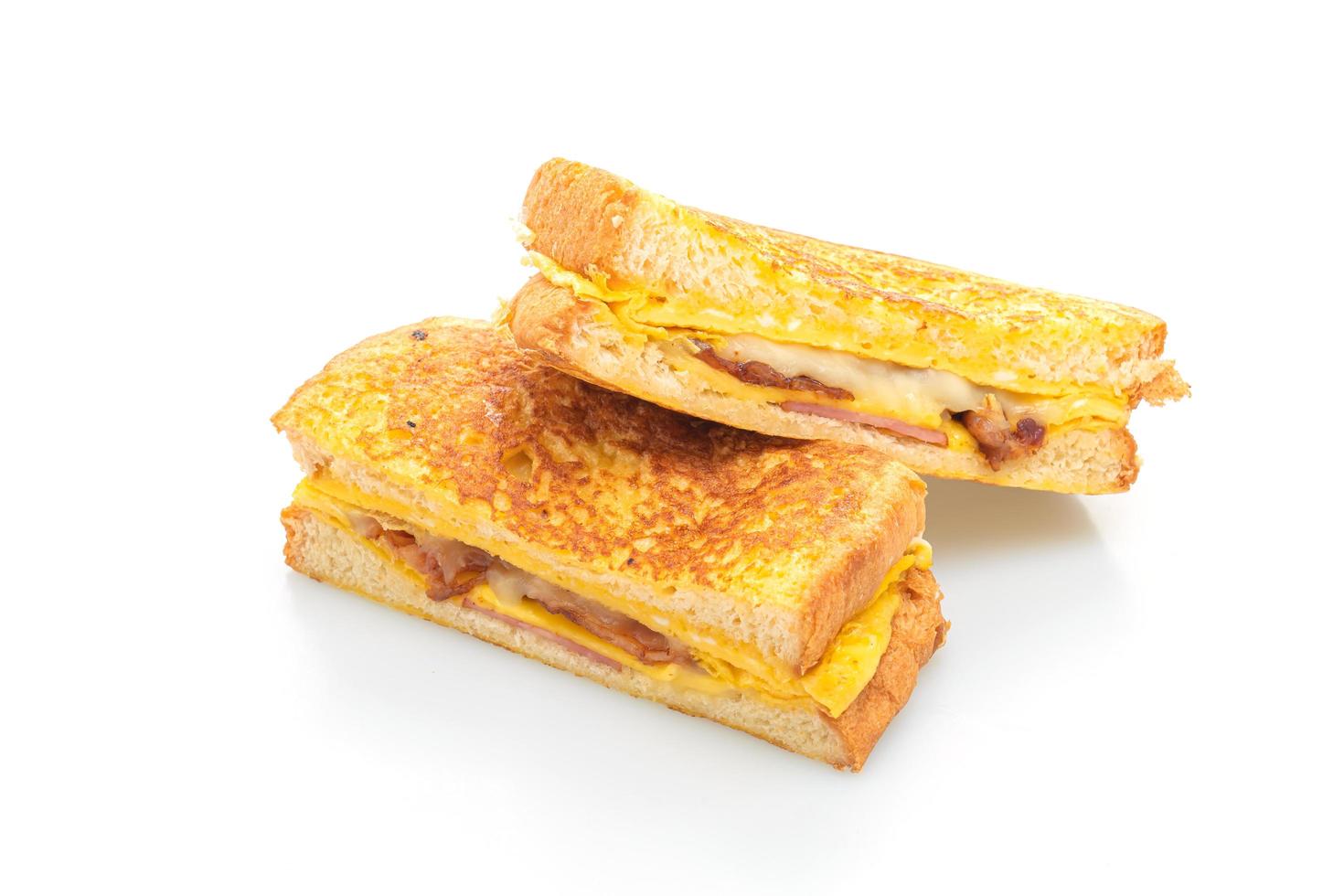 French toast ham bacon cheese sandwich with egg photo