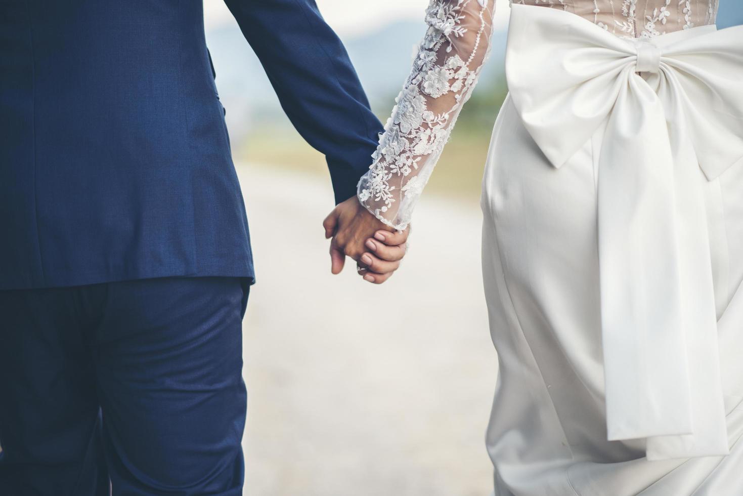 Close up of married couple holding hands in wedding day 3485274 Stock Photo  at Vecteezy