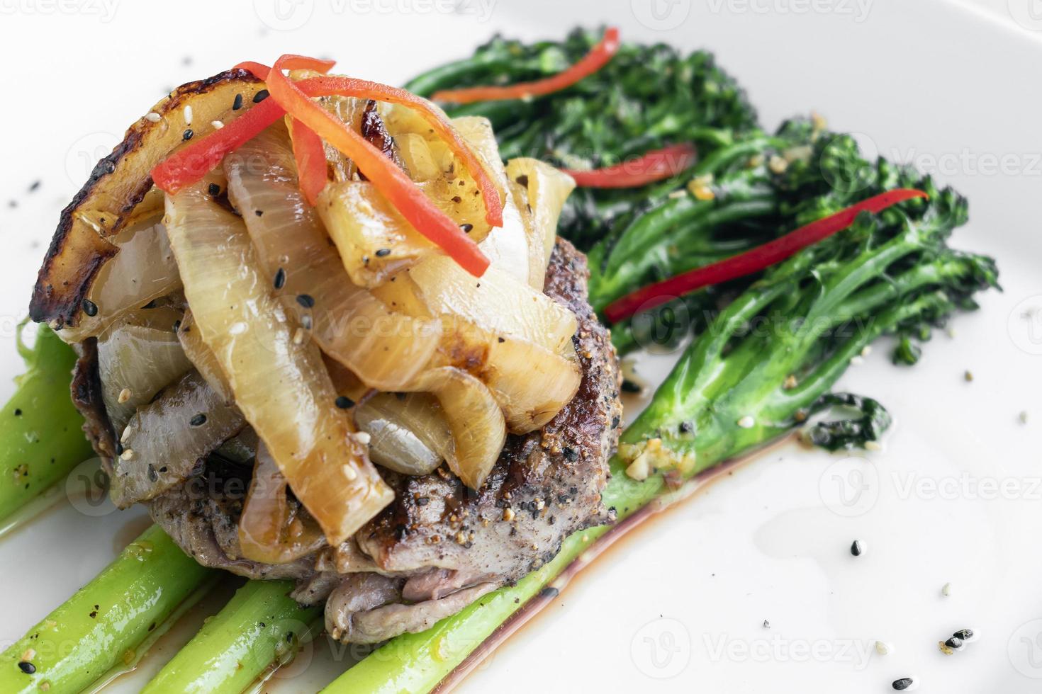 beef steak with caramelized onions and broccoli gourmet restaurant meal photo