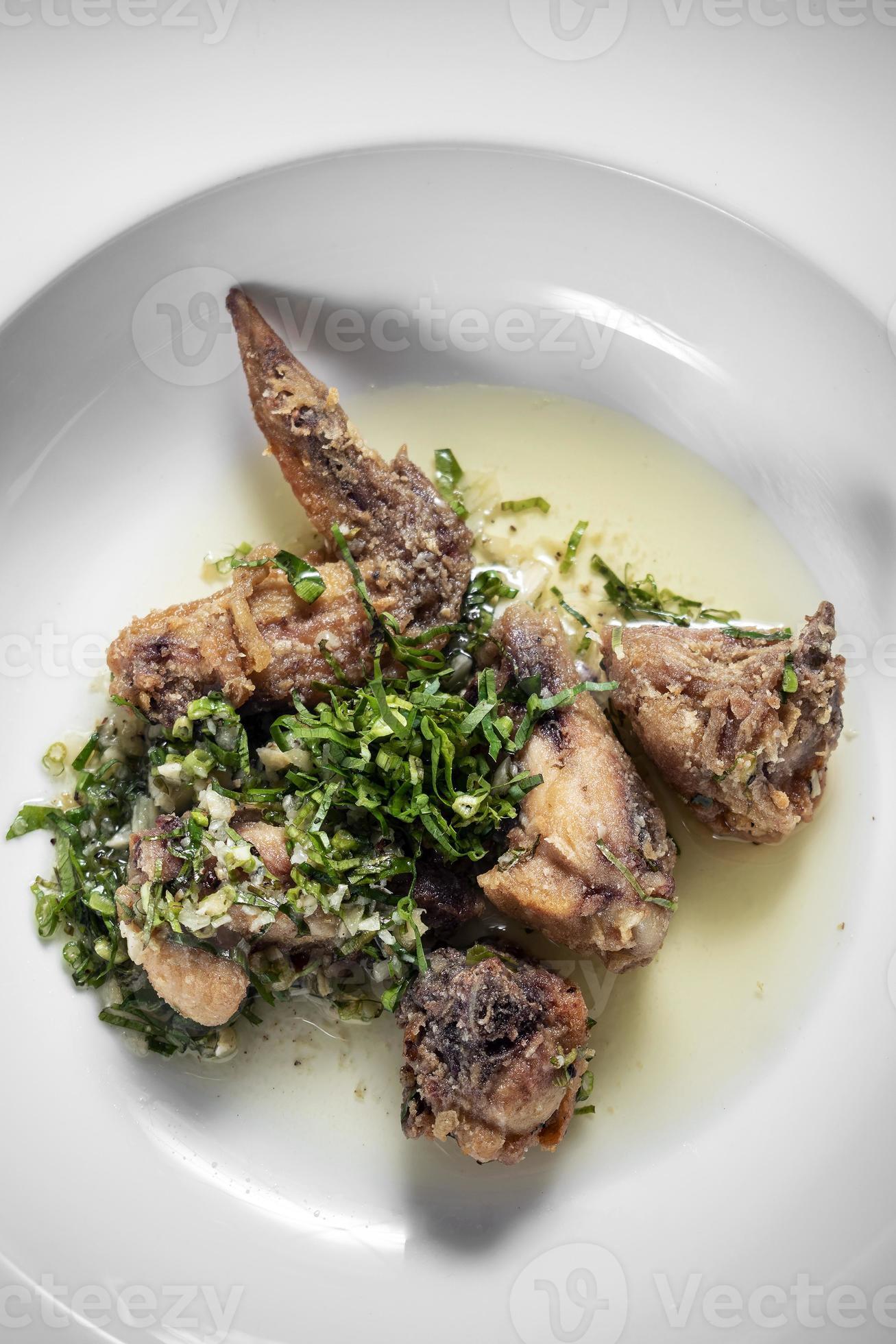 Portuguese spicy marinated deep fried chicken with garlic coriander sauce 3486318 Stock Photo at