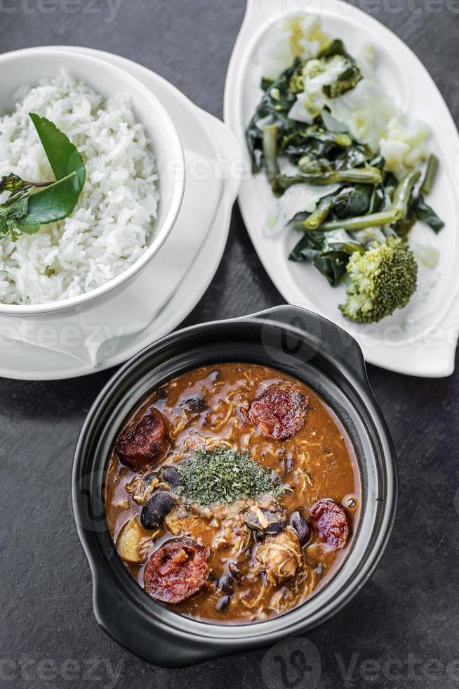 chicken feijoada with chorizo portuguese rustic spicy traditional bean stew photo