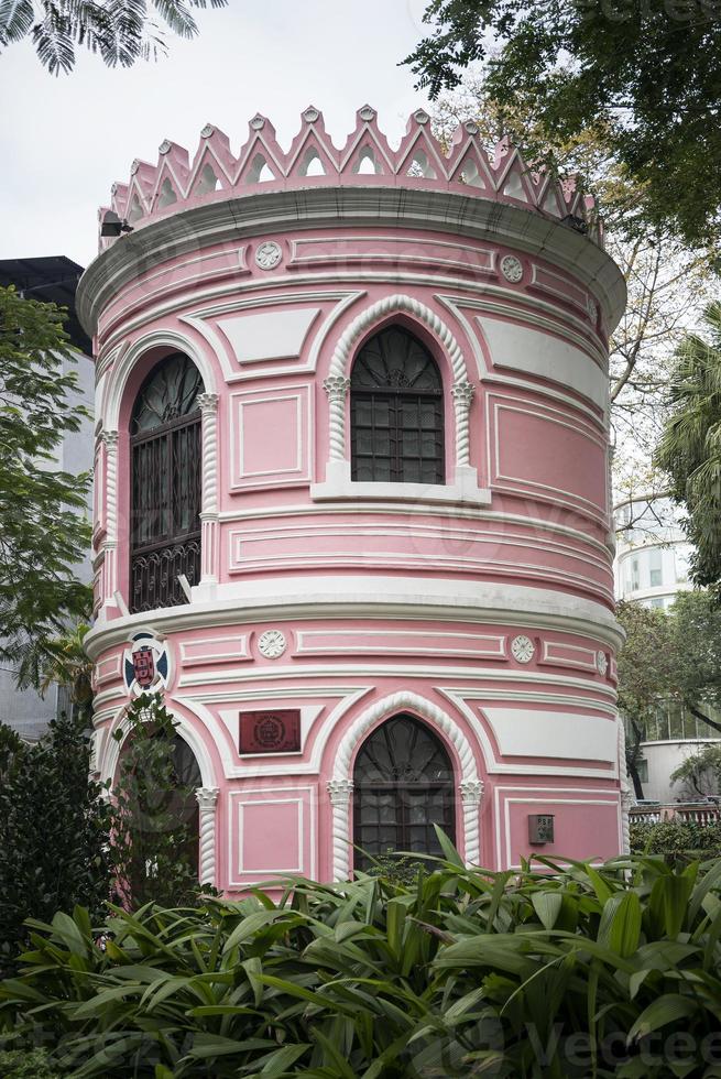 old portuguese colonial architecture building in macau park garden china photo
