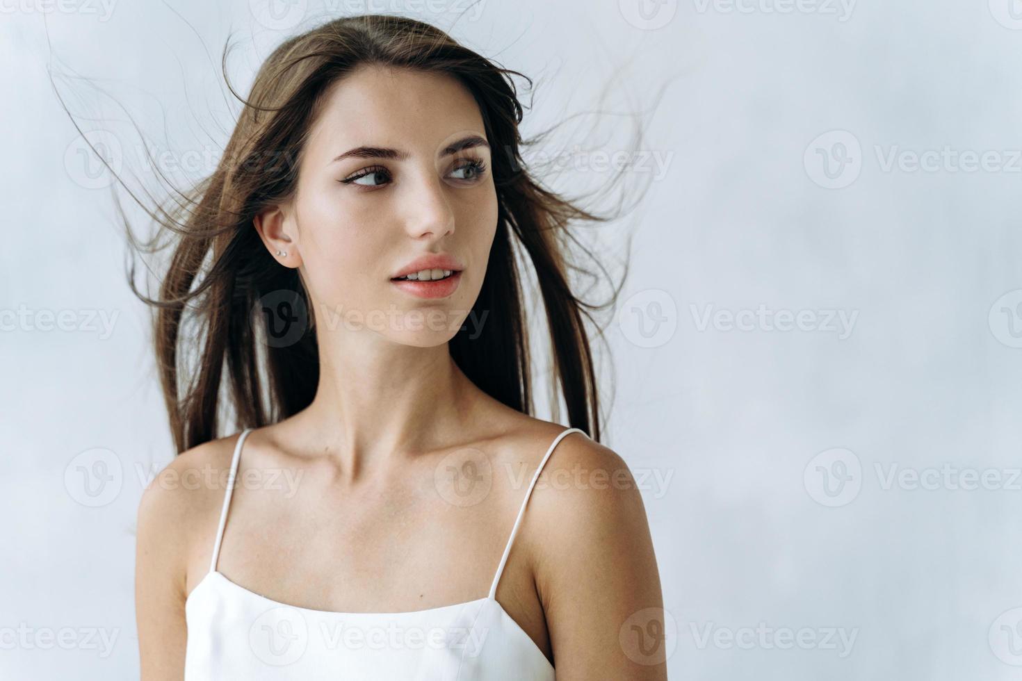 Portrait of beautiful woman with pretty face and naked shoulders. Beauty  fashion model woman face with perfect skin and nude makeup. Woman  appearance concept. Stock photo 3490307 Stock Photo at Vecteezy