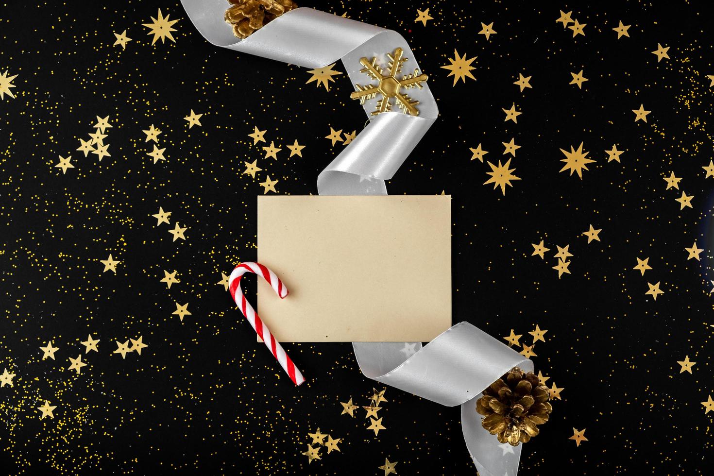 New Year greeting envelope lies on festive black background photo