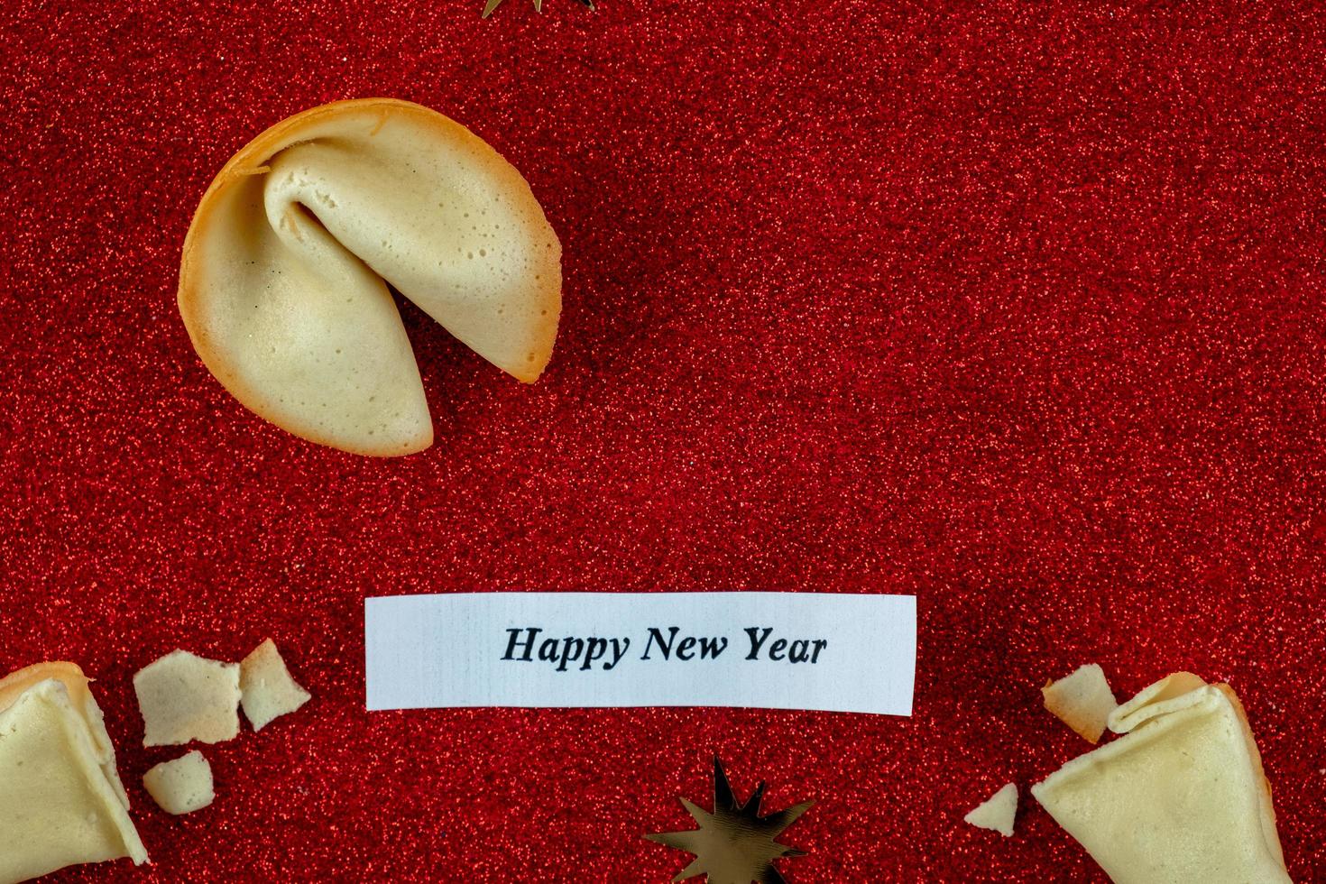 Fortune Cookie happiness with inscription Happy New Year photo
