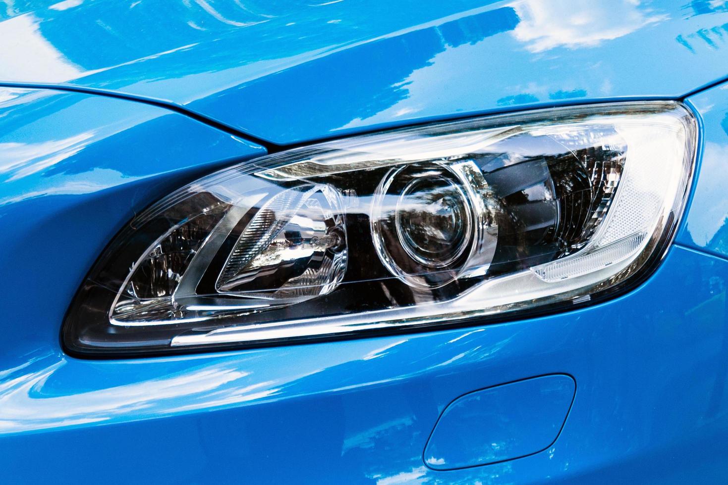 Modern car headlight, Blue car exterior detail photo