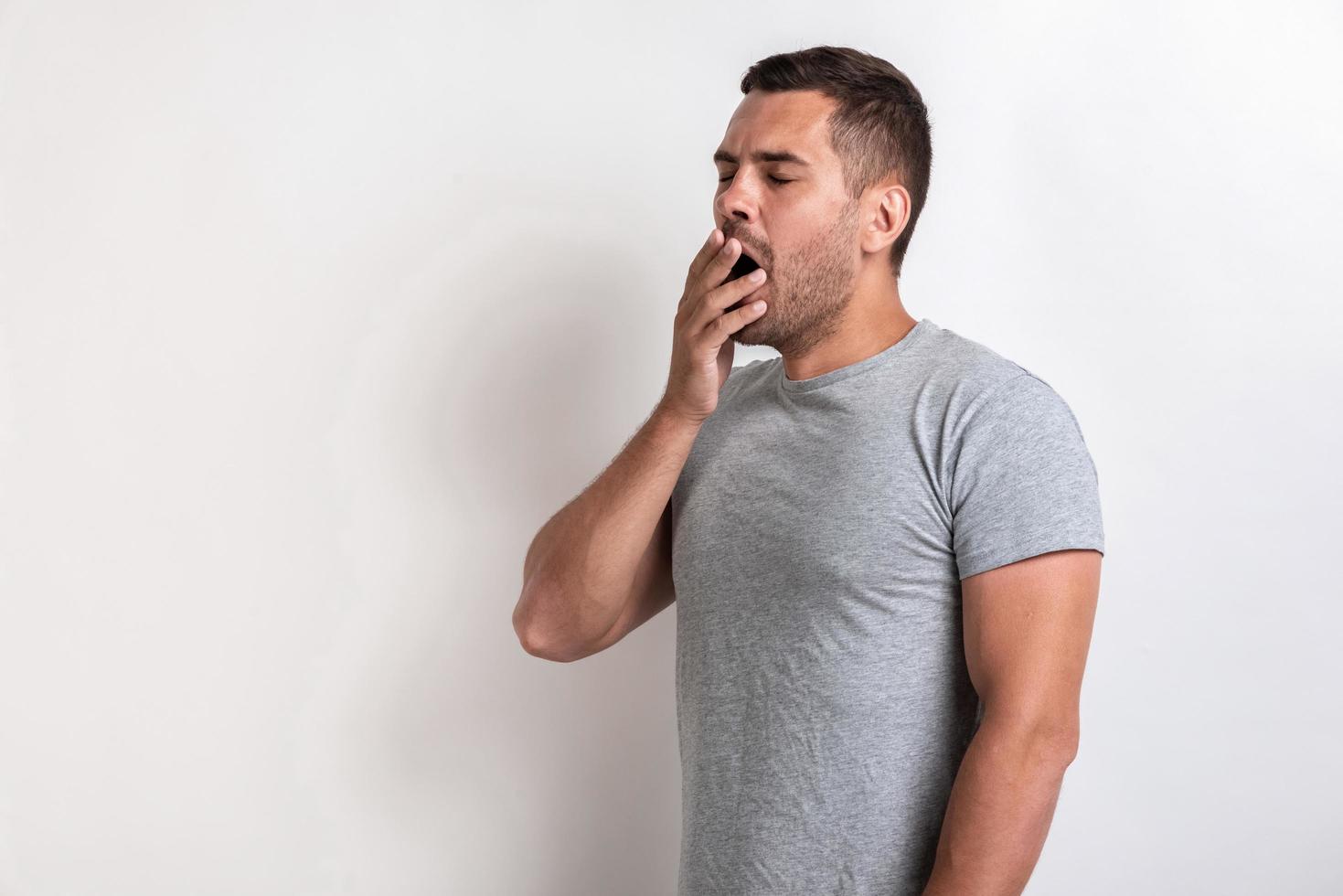 Portrait of gape man standing in the studio - Morning cocept image photo