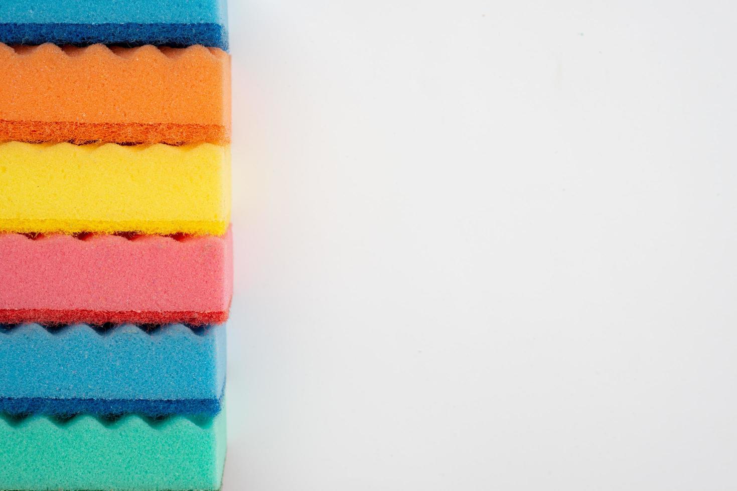 Stack of cleaning sponges isolated on a white background photo