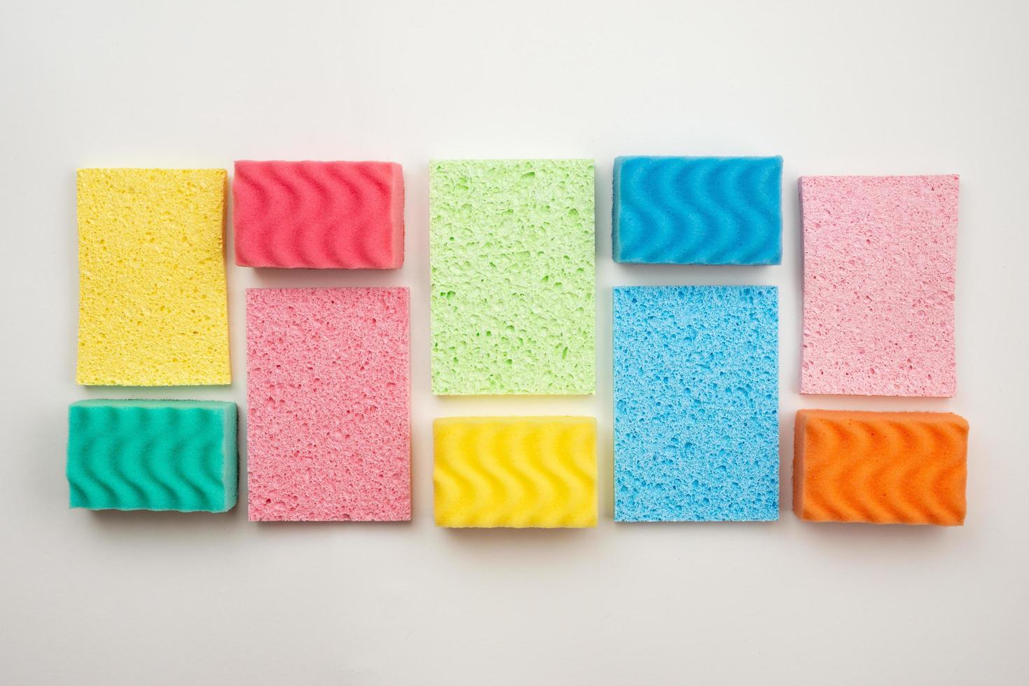 Multicolored washcloths outlined in a rectangle on a white background photo