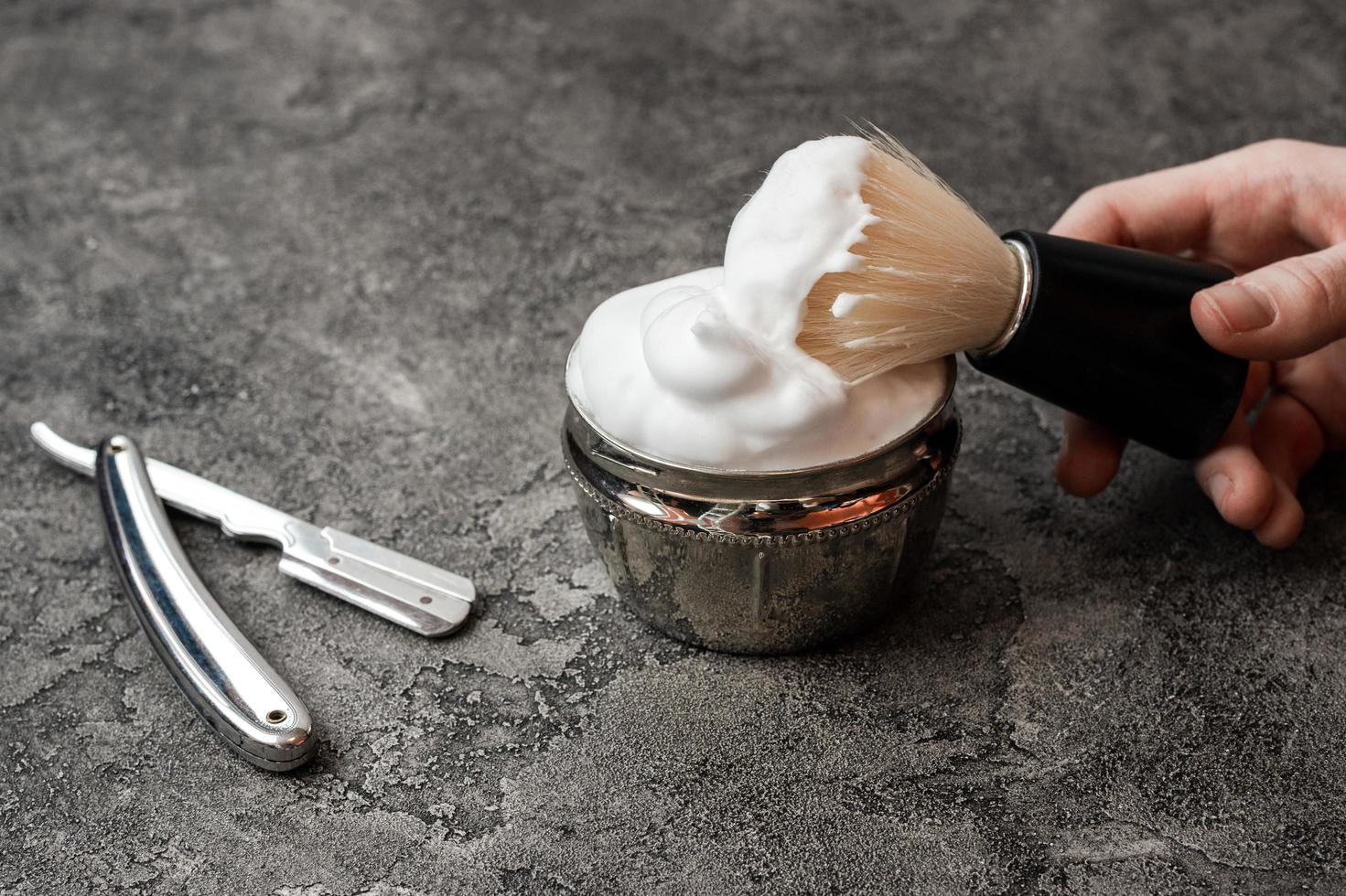 Shaving tools on a gray background photo