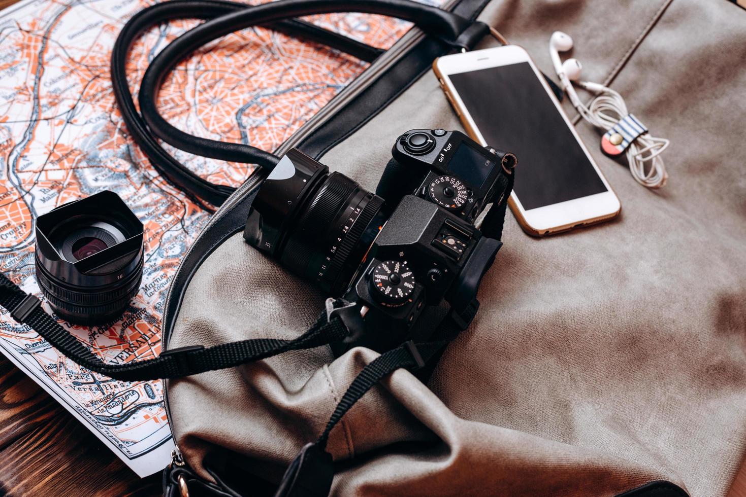 Photographer's equipment on the map photo