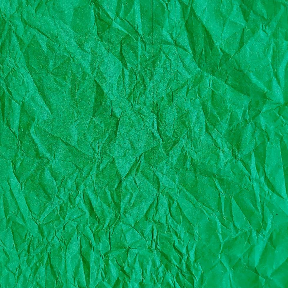 Fondo de textura de papel verde arrugado realista vector