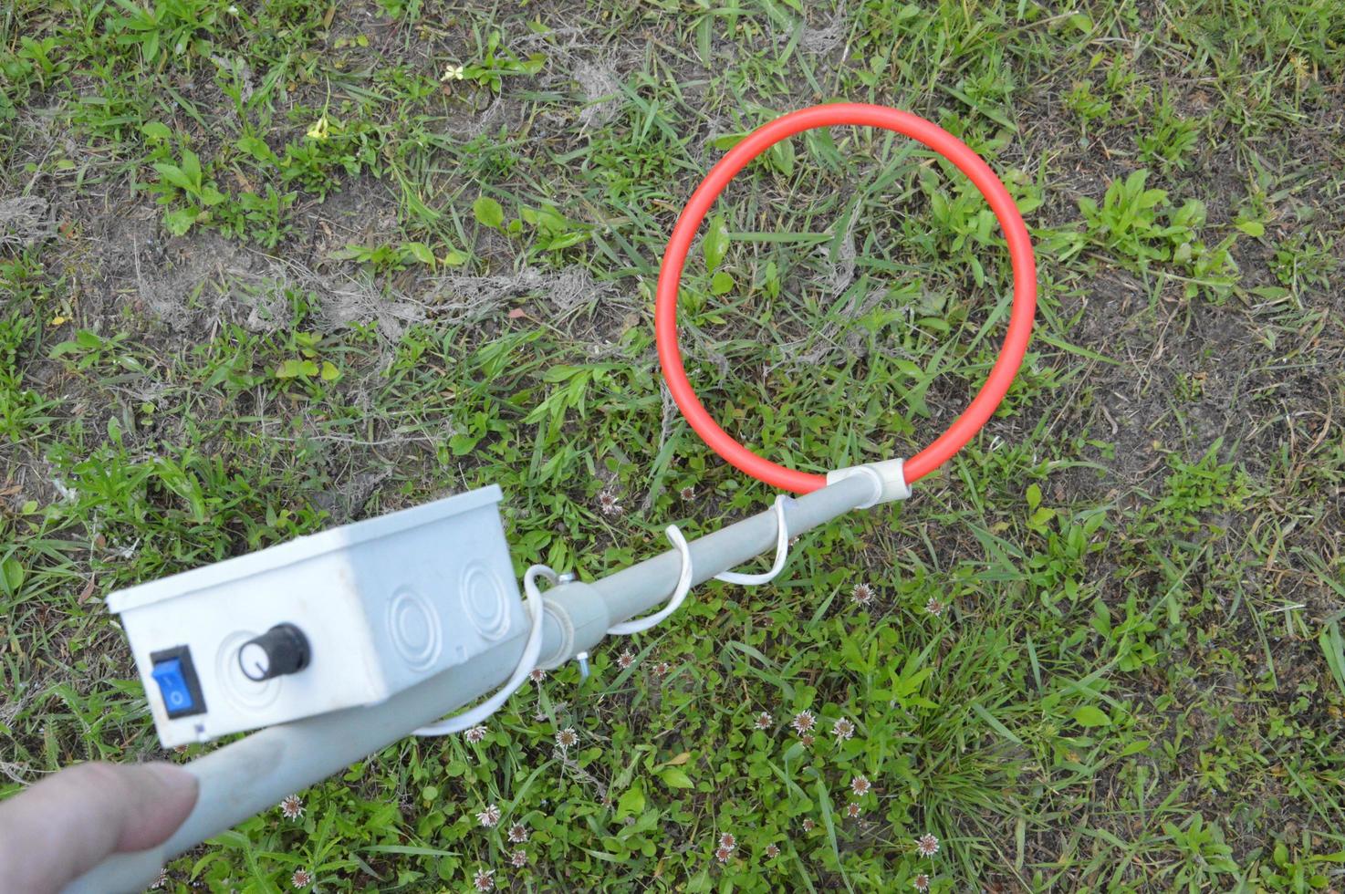 Hand held metal detector for searching for antiques photo