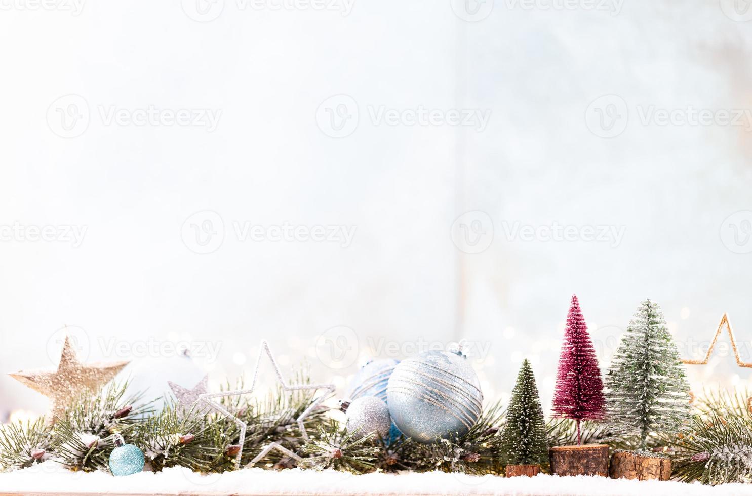 Christmas ornament with string lights on blue background. photo