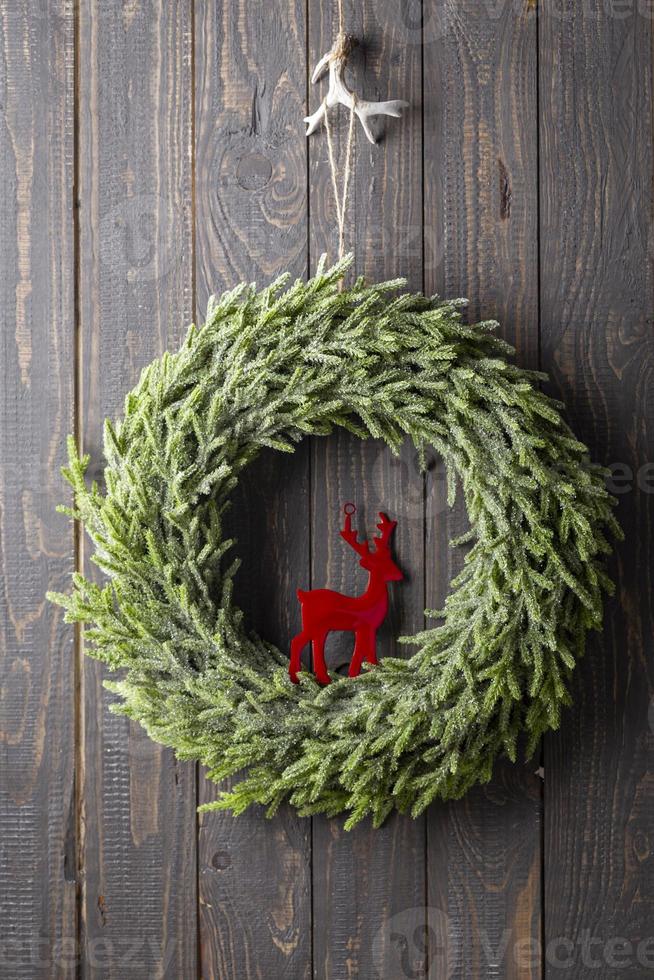 Christmas Wreath Hanging On The Door. photo