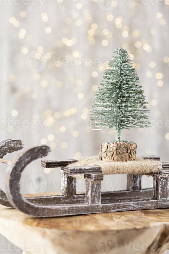 Christmas tree on bohek wooden, bokeh background. photo