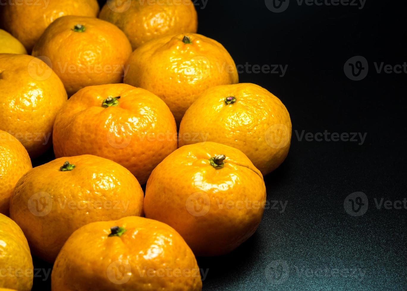 Glossy surface texture of freshness orange fruits photo