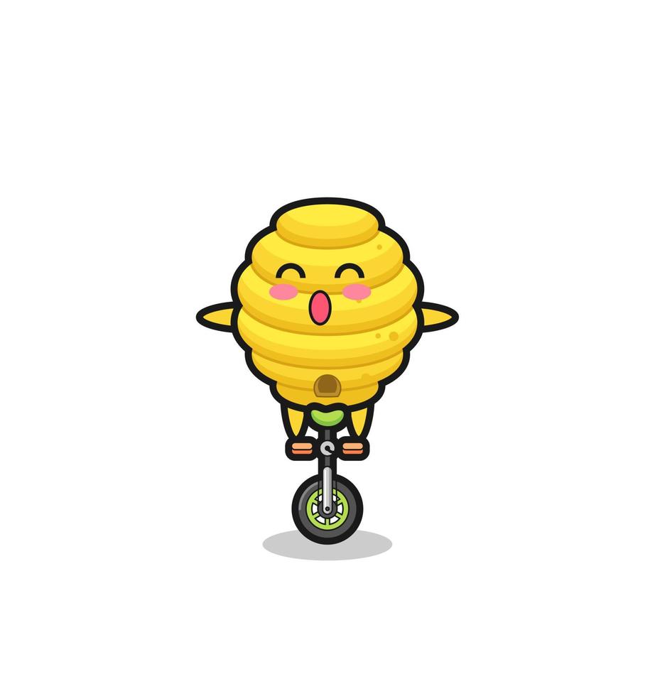 The cute bee hive character is riding a circus bike vector