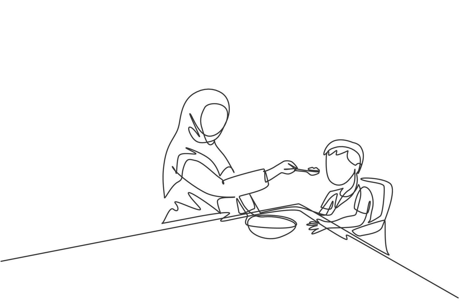 Single continuous line drawing of young Islamic mother feeding healthy food to son using spoon at home. Arabian muslim happy family motherhood concept. Trendy one line draw design vector illustration