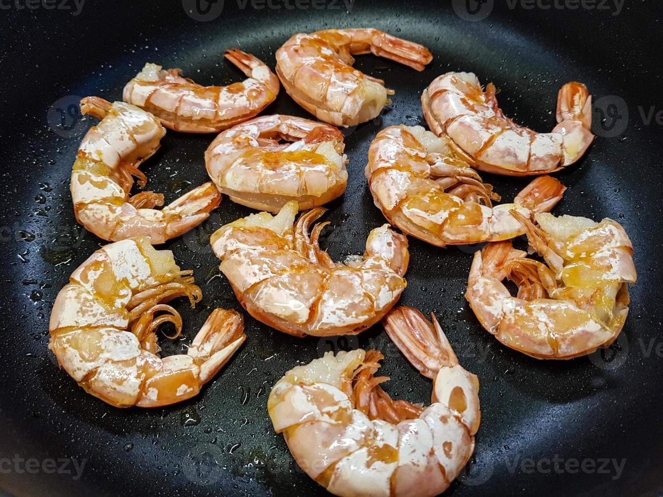 Easy peel shrimps in a pan photo